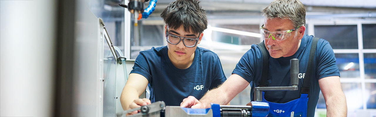 GF apprentice gaining hands-on knowledge from an expert