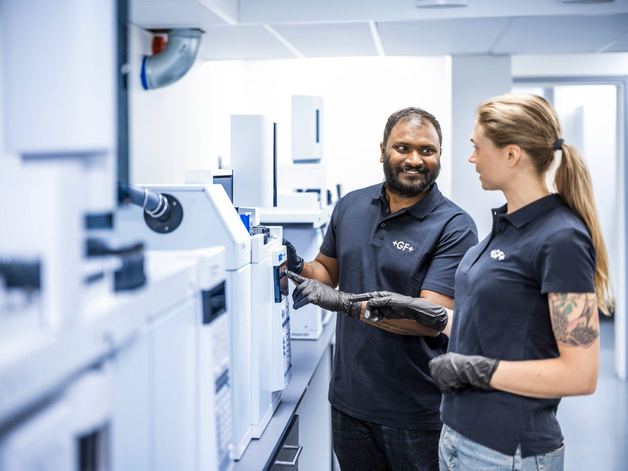 GF apprentice gaining hands-on knowledge from an expert