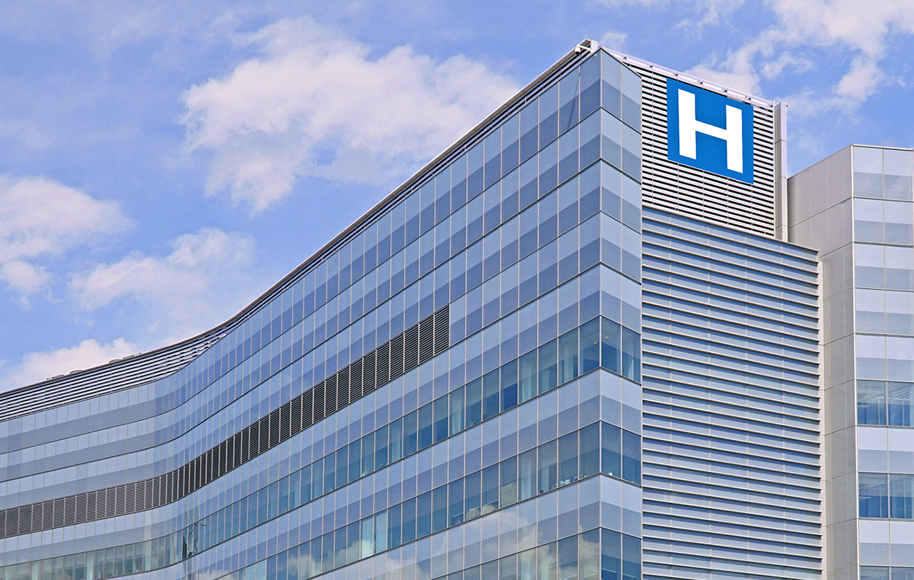Building with large H sign for hospital