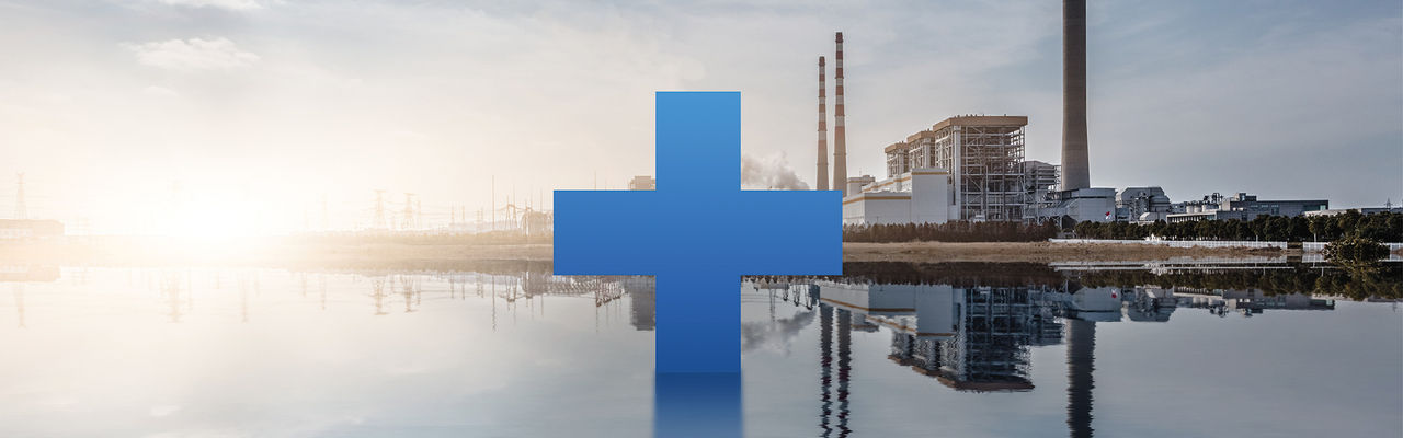 GF cross in front of manufacturing company